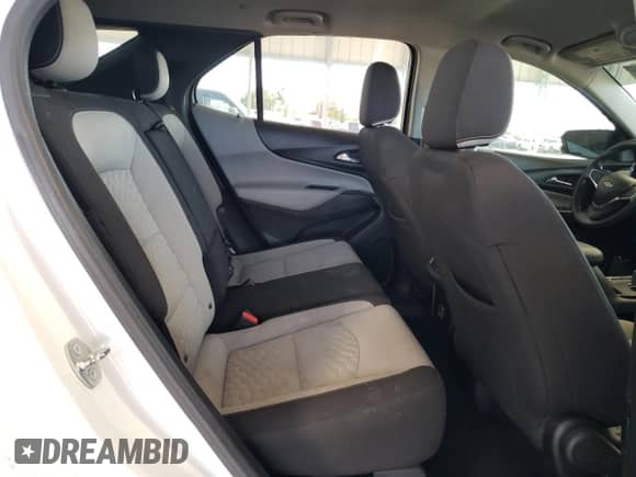 2020 Chevrolet Equinox LT z VIN 2GNAXKEV9L6140437, wystawiony jako Copart lot #89467805 z przebiegiem 118 515 mil mil oraz Czysty tytuł • Clean title. Historia ofert i sprzedaży dostępna na DreamBid. Obrazek 11.