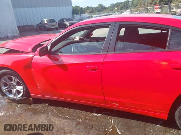 2022 Dodge Charger SXT with VIN 2C3CDXBG5NH224523, listed as a IAAI auction lot 43288039 with 86,532 mi miles and . Bid and sale history available at DreamBid. Image 14.