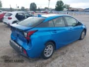 ✅ 2021 Toyota Prius L Eco • VIN: JTDKAMFUXM3141945 • Lot: 43016798. Listed on IAAI with 230,906 mi. Free auction sales archive from the USA and detailed vehicle history report at DreamBid. Image 4.