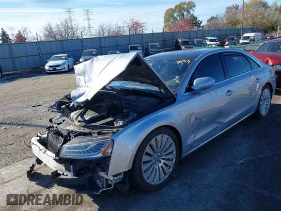 ✅ 2015 Audi A8 3.0T • VIN: WAU3GAFD7FN006279 • Lot: 43687493. Wystawiony na IAAI z przebiegiem 123 456 mil. Bezpłatny archiwum sprzedaży aukcyjnych z USA i szczegółowy raport historii pojazdu na DreamBid. Zdjęcie 18.