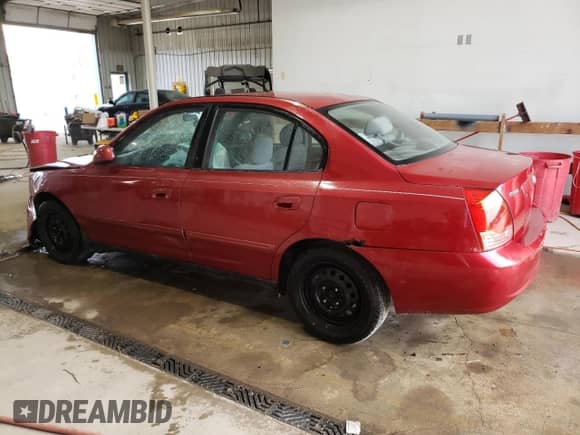 2004 Hyundai Elantra GLS z VIN KMHDN46D64U735399, wystawiony jako Copart lot #77533454 z przebiegiem Nie podano mil oraz Szkoda całkowita • Salvage title. Historia ofert i sprzedaży dostępna na DreamBid. Obrazek 2.