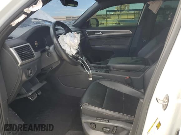 ✅ 2021 Volkswagen Atlas SEL R-Line • VIN: 1V2CE2CA9MC221744 • Лот: 52806875. Опубликован ранее на Copart с пробегом 124 407 миль. Бесплатный доступ к архиву аукционных продаж из США и подробный отчёт об истории автомобиля на DreamBid. Изображение 7.