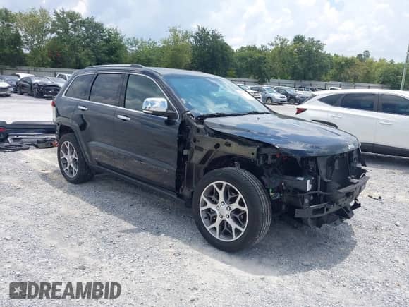 2021 Jeep Grand Cherokee 80th Anniversary with VIN 1C4RJEBG4MC570602, listed as a IAAI auction lot 42837515 with 40,796 mi miles and . Bid and sale history available at DreamBid. Image 1.