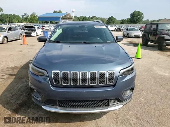 ✅ 2020 Jeep Cherokee Altitude • VIN: 1C4PJLLB4LD653986 • Lot: 66932065. Listed on Copart with 99,629 mi. Free auction sales archive from the USA and detailed vehicle history report at DreamBid. Image 14.