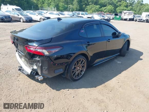 2023 Toyota Camry SE with VIN 4T1G11BKXPU097643, listed as a IAAI auction lot 42833306 with 23,580 mi miles and . Bid and sale history available at DreamBid. Image 4.