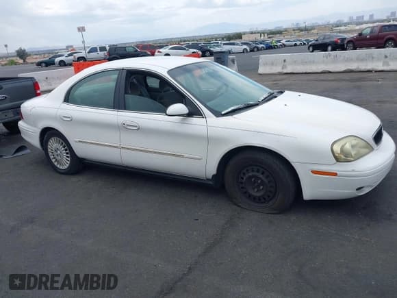 ✅ 2002 Mercury Sable GS • VIN: 1MEFM50U12G628060 • Lot: 42072436. Listed on IAAI with 139,336 mi. Free auction sales archive from the USA and detailed vehicle history report at DreamBid. Image 13.