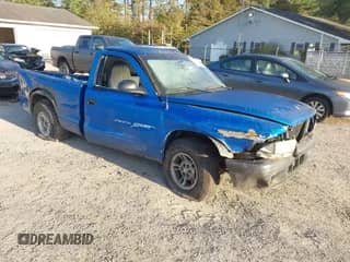 1998 Dodge Dakota SLT z VIN 1B7FL26X1WS608656, wystawiony jako IAAI lot #43318630 z przebiegiem 153 876 mil mil oraz . Historia ofert i sprzedaży dostępna na DreamBid. Obrazek 1.