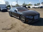 ✅ 2022 Bentley Continental GT GT V8 • VIN: SCBCG2ZG5NC092767 • Lot: 71908575. Listed on Copart with 10,231 mi. Free auction sales archive from the USA and detailed vehicle history report at DreamBid. Image 13.