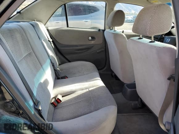 ✅ 2000 Mazda Protege DX • VIN: JM1BJ2220Y0239835 • Lot: 80228864. Wystawiony na Copart z przebiegiem 200 936 mil. Bezpłatny archiwum sprzedaży aukcyjnych z USA i szczegółowy raport historii pojazdu na DreamBid. Zdjęcie 10.