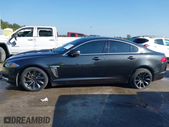 ✅ 2014 Jaguar XF SC • VIN: SAJWA0EX0E8U14421 • Lot: 40380588. Listed on IAAI with 74,345 mi. Free auction sales archive from the USA and detailed vehicle history report at DreamBid. Image 14.