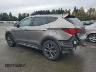 2017 Hyundai Santa Fe Ultimate z VIN 5XYZWDLA3HG485502, wystawiony jako Copart lot #90261245 z przebiegiem 84 872 mil mil oraz Szkoda całkowita • Salvage title. Historia ofert i sprzedaży dostępna na DreamBid. Obrazek 2.