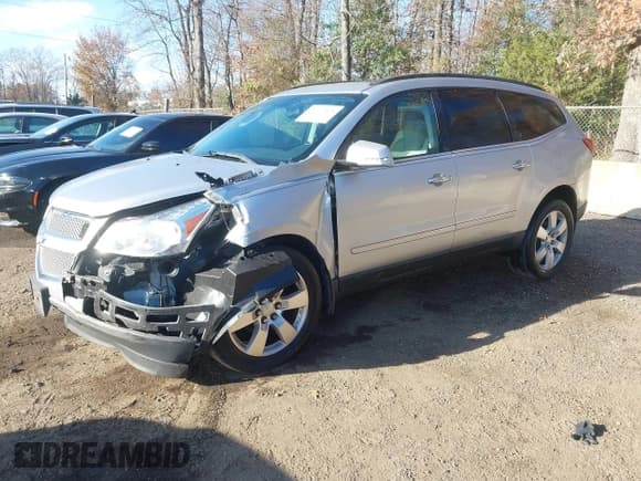 ✅ 2011 Chevrolet Traverse LTZ • VIN: 1GNKRLED9BJ287953 • Lot: 43690848. Wystawiony na IAAI z przebiegiem 134 609 mil. Bezpłatny archiwum sprzedaży aukcyjnych z USA i szczegółowy raport historii pojazdu na DreamBid. Zdjęcie 2.
