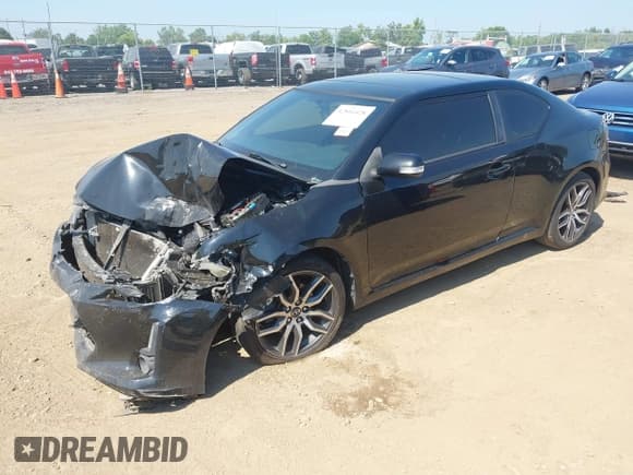 ✅ 2015 Scion tC • VIN: JTKJF5C7XFJ000690 • Lot: 42816428. Listed on IAAI with 181,743 mi. Free auction sales archive from the USA and detailed vehicle history report at DreamBid. Image 2.