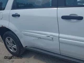 ✅ 2006 Chevrolet Equinox LS • VIN: 2CNDL23F566190491 • Лот: 42424359. Опубликован ранее на IAAI с пробегом 148 497 миль. Бесплатный доступ к архиву аукционных продаж из США и подробный отчёт об истории автомобиля на DreamBid. Изображение 6.