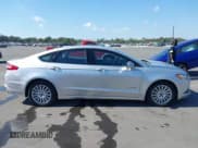 ✅ 2013 Ford Fusion SE Hybrid • VIN: 3FA6P0LU8DR262977 • Lot: 43729571. Listed on IAAI with 115,875 mi. Free auction sales archive from the USA and detailed vehicle history report at DreamBid. Image 13.