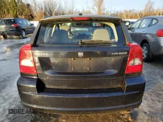 ✅ 2010 Dodge Caliber Mainstreet • VIN: 1B3CB3HAXAD648284 • Лот: 84856604. Опубликован ранее на Copart с пробегом 84 032 миль. Бесплатный доступ к архиву аукционных продаж из США и подробный отчёт об истории автомобиля на DreamBid. Изображение 6.