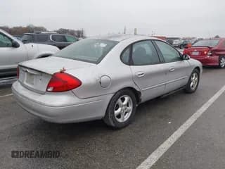 ✅ 2003 Ford Taurus SE Standard • VIN: 1FAFP53U13A216736 • Lot: 43728297. Wystawiony na IAAI z przebiegiem 246 926 mil. Bezpłatny archiwum sprzedaży aukcyjnych z USA i szczegółowy raport historii pojazdu na DreamBid. Zdjęcie 4.