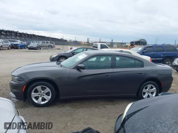 ✅ 2015 Dodge Charger SXT • VIN: 2C3CDXHG5FH852204 • Lot: 43640564. Listed on IAAI with 175,431 mi. Free auction sales archive from the USA and detailed vehicle history report at DreamBid. Image 14.