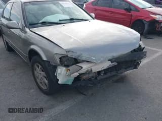 ✅ 1999 Toyota Camry LE • VIN: JT2BF22K8X0157912 • Lot: 43734904. Wystawiony na IAAI z przebiegiem 165 409 mil. Bezpłatny archiwum sprzedaży aukcyjnych z USA i szczegółowy raport historii pojazdu na DreamBid. Zdjęcie 6.