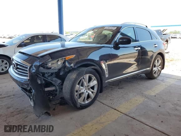 ✅ 2015 Infiniti QX70 • VIN: JN8CS1MW9FM481836 • Lot: 57801425. Listed on Copart with 130,011 mi. Free auction sales archive from the USA and detailed vehicle history report at DreamBid. Image 1.