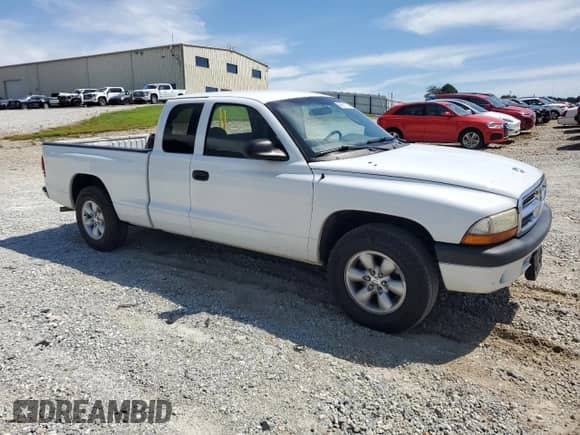 2004 Dodge Dakota Sport z VIN 1D7GL32K44S639553, wystawiony jako Copart lot #69651125 z przebiegiem 197 676 mil mil oraz Szkoda całkowita • Salvage title. Historia ofert i sprzedaży dostępna na DreamBid. Obrazek 4.