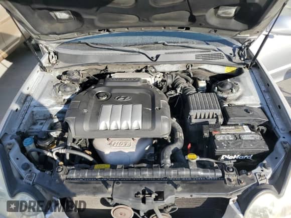 2004 Hyundai Sonata z VIN KMHWF25S04A039620, wystawiony jako Copart lot #84199634 z przebiegiem 227 690 mil mil oraz Szkoda całkowita • Salvage title. Historia ofert i sprzedaży dostępna na DreamBid. Obrazek 12.