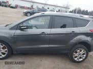 ✅ 2015 Ford Escape Titanium • VIN: 1FMCU0J98FUC22121 • Lot: 41145013. Listed on IAAI with 140,689 mi. Free auction sales archive from the USA and detailed vehicle history report at DreamBid. Image 14.