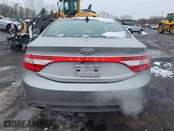 2014 Hyundai Azera Limited with VIN KMHFH4JG6EA361378, listed as a IAAI auction lot 41557210 with 58,561 mi miles and . Bid and sale history available at DreamBid. Image 16.