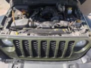 ✅ 2022 Jeep Gladiator Sport S • VIN: 1C6JJTAG2NL127148 • Lot: 57421725. Listed on Copart with 56,891 mi. Free auction sales archive from the USA and detailed vehicle history report at DreamBid. Image 11.