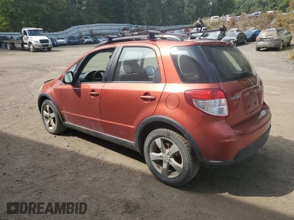 ✅ 2012 Suzuki SX4 Crossover • VIN: JS2YB5A34C6308024 • Лот: 71259074. Опубликован ранее на Copart с пробегом 171 165 миль. Бесплатный доступ к архиву аукционных продаж из США и подробный отчёт об истории автомобиля на DreamBid. Изображение 2.