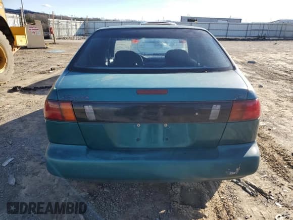✅ 1997 Nissan Sentra XE • VIN: 3N1AB41D7VL006933 • Lot: 86178884. Wystawiony na Copart z przebiegiem 382 905 mil. Bezpłatny archiwum sprzedaży aukcyjnych z USA i szczegółowy raport historii pojazdu na DreamBid. Zdjęcie 6.