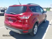 ✅ 2014 Ford Escape SE • VIN: 1FMCU9GX3EUB64623 • Lot: 42560923. Listed on IAAI with 120,730 mi. Free auction sales archive from the USA and detailed vehicle history report at DreamBid. Image 4.