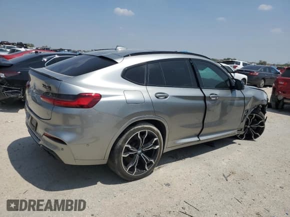 ✅ 2021 BMW X4 M • VIN: 5YMUJ0C03M9D96933 • Lot: 64650153. Listed on Copart with 27,157 mi. Free auction sales archive from the USA and detailed vehicle history report at DreamBid. Image 3.