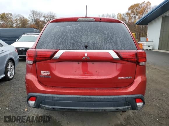 2016 Mitsubishi Outlander SE с VIN JA4AZ3A33GZ015564, выставлен на аукционе Copart как лот 90450495 с пробегом 203 258 миль миль и Чистый • Clean title. История ставок и продаж доступна на DreamBid. Изображение 6.