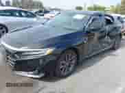 2022 Honda Accord EX-L z VIN 1HGCV1F56NA062366, wystawiony jako IAAI lot #42903840 z przebiegiem 70 731 mil mil oraz . Historia ofert i sprzedaży dostępna na DreamBid. Obrazek 2.