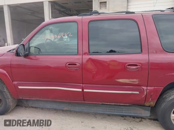 ✅ 2004 Chevrolet Suburban LT • VIN: 1GNFK16ZX4J231897 • Lot: 42406882. Listed on IAAI with 221,177 mi. Free auction sales archive from the USA and detailed vehicle history report at DreamBid. Image 14.