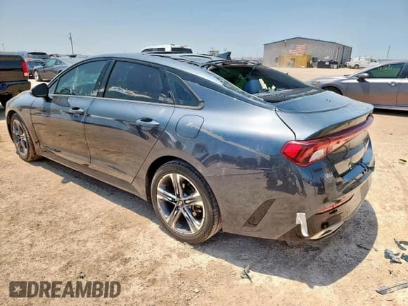 ✅ 2021 Kia K5 EX • VIN: 5XXG34J26MG008590 • Лот: 84569625. Опубликован ранее на Copart с пробегом 84 551 миль. Бесплатный доступ к архиву аукционных продаж из США и подробный отчёт об истории автомобиля на DreamBid. Изображение 2.