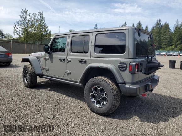 ✅ 2023 Jeep Wrangler Rubicon • VIN: 1C4HJXFG3PW600015 • Lot: 56398405. Listed on Copart with 41,181 mi. Free auction sales archive from the USA and detailed vehicle history report at DreamBid. Image 2.