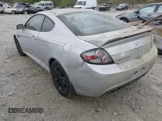 2008 Hyundai Tiburon GS с VIN KMHHM66D68U264666, выставлен на аукционе IAAI как лот 41970123 с пробегом 186 448 миль миль и . История ставок и продаж доступна на DreamBid. Изображение 3.