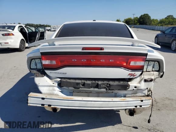 ✅ 2014 Dodge Charger Road/Track • VIN: 2C3CDXCT7EH221487 • Lot: 71080555. Listed on Copart with 133,045 mi. Free auction sales archive from the USA and detailed vehicle history report at DreamBid. Image 6.