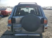 ✅ 2000 Toyota RAV4 • VIN: JT3GP10V0Y7066258 • Лот: 72776334. Опубликован ранее на Copart с пробегом 228 243 миль. Бесплатный доступ к архиву аукционных продаж из США и подробный отчёт об истории автомобиля на DreamBid. Изображение 6.