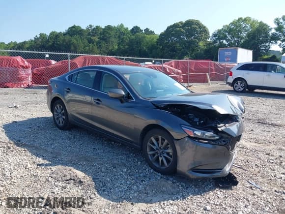 ✅ 2021 Mazda 6 Sport • VIN: JM1GL1UM8M1607384 • Lot: 42564135. Listed on IAAI with 66,798 mi. Free auction sales archive from the USA and detailed vehicle history report at DreamBid. Image 1.