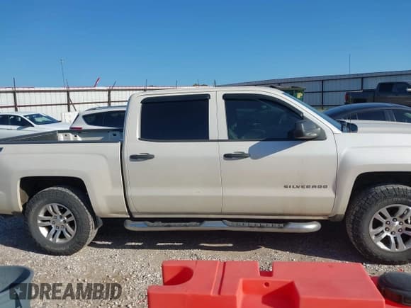 ✅ 2014 Chevrolet Silverado 1500 LT • VIN: 3GCUKREC1EG244911 • Лот: 42762159. Опубликован ранее на IAAI с пробегом 127 545 миль. Бесплатный доступ к архиву аукционных продаж из США и подробный отчёт об истории автомобиля на DreamBid. Изображение 13.