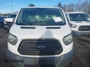 ✅ 2015 Ford Transit Cargo • VIN: 1FTNE1ZM1FKA92882 • Lot: 43742421. Listed on IAAI with 327,116 mi. Free auction sales archive from the USA and detailed vehicle history report at DreamBid. Image 6.
