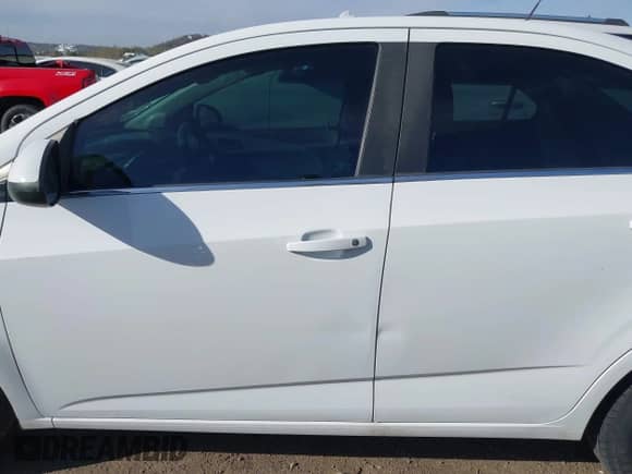 2017 Chevrolet Sonic LT with VIN 1G1JD5SBXH4178144, listed as a IAAI auction lot 41869622 with 110,238 mi miles and . Bid and sale history available at DreamBid. Image 14.