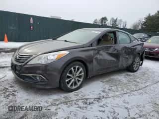 2016 Hyundai Azera z VIN KMHFG4JGXGA505987, wystawiony jako Copart lot #87598765 z przebiegiem 93 603 mil mil oraz Szkoda całkowita • Salvage title. Historia ofert i sprzedaży dostępna na DreamBid. Obrazek 1.