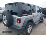 ✅ 2023 Jeep Wrangler Sport • VIN: 1C4HJXDG2PW508235 • Lot: 42127823. Listed on IAAI with 25,069 mi. Free auction sales archive from the USA and detailed vehicle history report at DreamBid. Image 4.