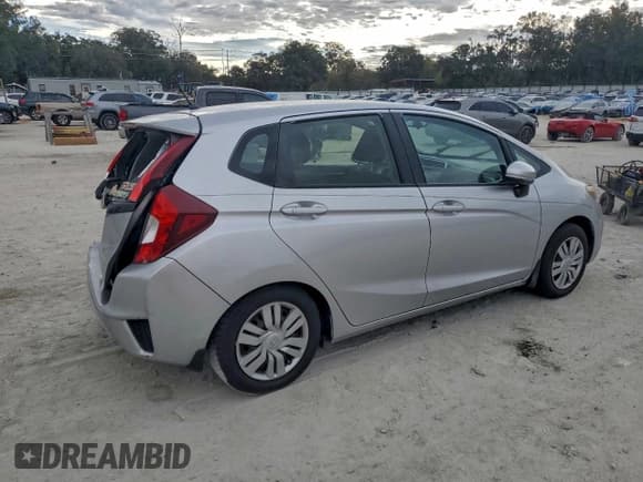 ✅ 2016 Honda Fit LX • VIN: JHMGK5H53GS006989 • Lot: 94464495. Listed on Copart with 106,629 mi. Free auction sales archive from the USA and detailed vehicle history report at DreamBid. Image 3.