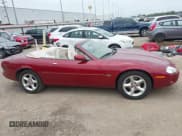 ✅ 2000 Jaguar XK • VIN: SAJJA42C2YNA02738 • Lot: 42703175. Listed on IAAI with Not provided. Free auction sales archive from the USA and detailed vehicle history report at DreamBid. Image 13.