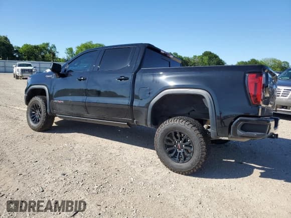 ✅ 2023 GMC Sierra 1500 AT4X • VIN: 3GTUUFELXPG214964 • Лот: 52615995. Опубликован ранее на Copart с пробегом 61 584 миль. Бесплатный доступ к архиву аукционных продаж из США и подробный отчёт об истории автомобиля на DreamBid. Изображение 2.